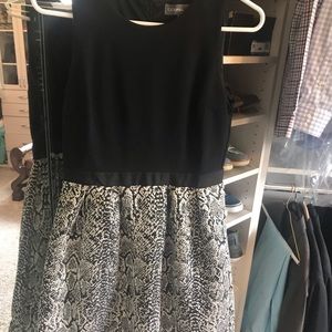 Black and gold sleeveless dress